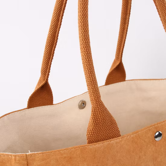 デュポン社が再生紙とタイベック ショッピング バッグを使用した環境に優しいショッピング バッグをカスタマイズしました。